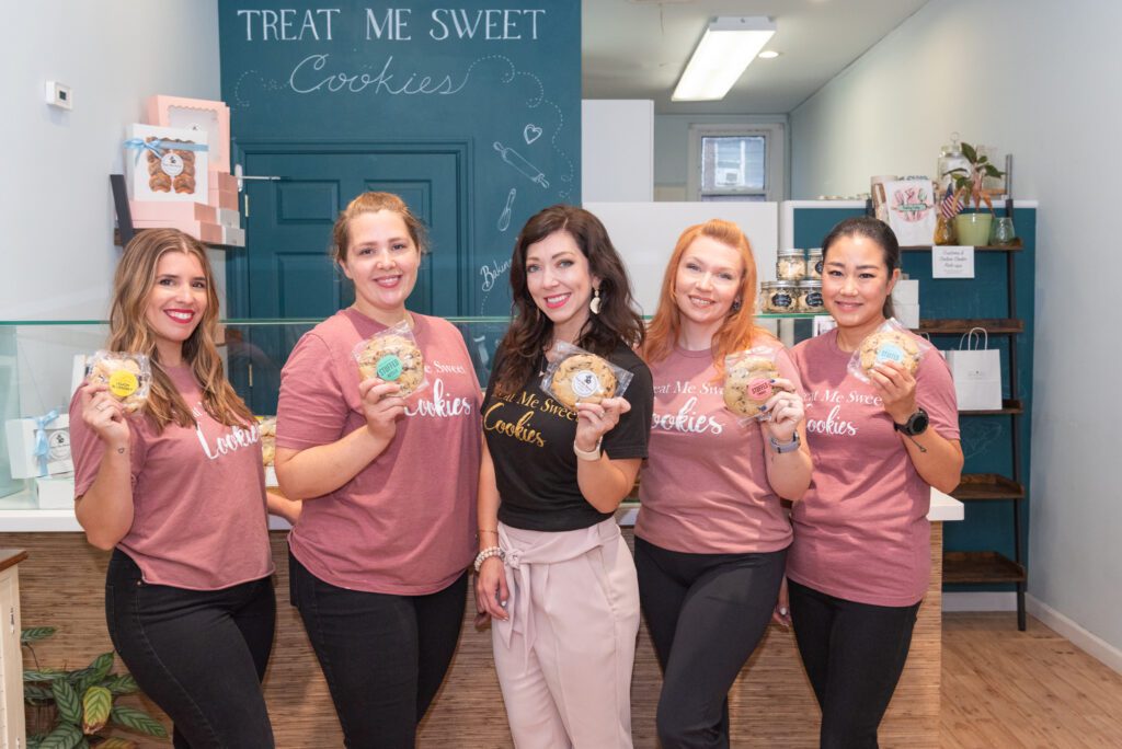 The owner and the staff of Treat Me Sweet Cookies in Ridgewood, New Jersey.