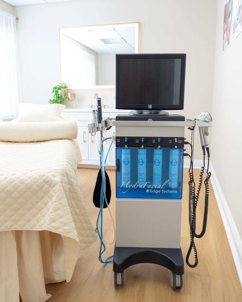 Hydrafacial machine in an aesthetician's treatment room.